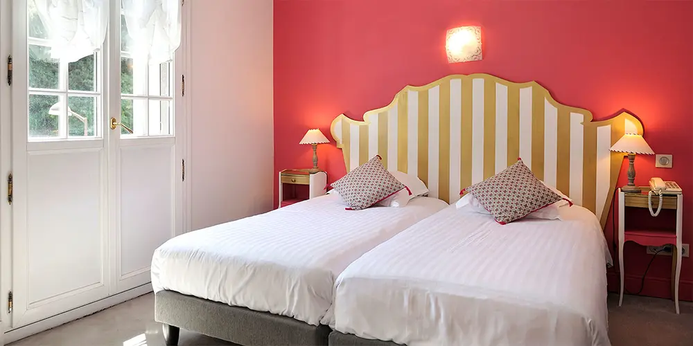 Chambre supérieure avec 2 lits
